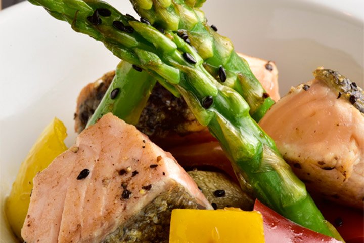 Baby vegetables with or without salmon and teriyaki sauce served at The White Box Restaurant in The